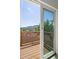 Gorgeous balcony view from the sliding glass doors with scenic views of the mountains and nature at 420 Sunshine Pkwy, Golden, CO 80403
