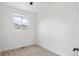 Neutral bedroom with carpet, bright window with mountain views, and white walls at 420 Sunshine Pkwy, Golden, CO 80403