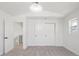 Neutral bedroom featuring large closet, gray carpet, white walls, and natural light at 420 Sunshine Pkwy, Golden, CO 80403