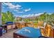 Outdoor patio deck with grill, table, and chair set perfect for Gathering gatherings at 420 Sunshine Pkwy, Golden, CO 80403