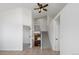 Open-concept living room with tile floors, high ceilings, and bright natural light shining in at 420 Sunshine Pkwy, Golden, CO 80403