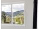Window view showcasing stunning mountain scenery at 420 Sunshine Pkwy, Golden, CO 80403