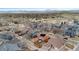 Community aerial view with mountain scenery and various home styles at 2414 Winding Dr, Longmont, CO 80504