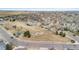 Community aerial view with play area, homes, and open space at 2414 Winding Dr, Longmont, CO 80504