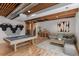 Finished basement featuring a pool table, bar, and a cozy seating area at 2414 Winding Dr, Longmont, CO 80504