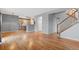 Spacious living room features a window and staircase with access to the second floor at 2414 Winding Dr, Longmont, CO 80504