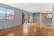 Spacious living room features a window and sliding door with access to the outside at 2414 Winding Dr, Longmont, CO 80504
