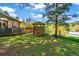 Enjoy outdoor gatherings in the yard with a stone gazebo and a covered area, perfect for relaxing in nature at 26351 Sheldon St, Kittredge, CO 80457