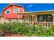 Welcoming front porch with decorative details and curb appeal at 15373 Uravan St, Brighton, CO 80601