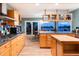 Modern kitchen with island and stainless steel appliances at 3780 Lakebriar Dr, Boulder, CO 80304