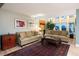 Bright living room showcasing large windows and comfortable seating at 3780 Lakebriar Dr, Boulder, CO 80304