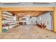 Unfinished basement, ideal for storage or finishing, with exposed beam ceiling and built-in shelves at 4095 Field Dr, Wheat Ridge, CO 80033