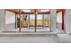 Inviting sunroom featuring multiple windows and access to the deck, ideal for relaxation at 4095 Field Dr, Wheat Ridge, CO 80033