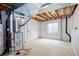 Unfinished basement featuring exposed ceiling and framing with updated mechanics at 10364 Ravenswood Way, Highlands Ranch, CO 80130