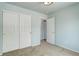 Bedroom featuring a closet, ample space, and an open doorway leading to another room at 10364 Ravenswood Way, Highlands Ranch, CO 80130