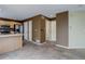 Kitchen with stainless steel appliances, a breakfast bar, and tile flooring at 10364 Ravenswood Way, Highlands Ranch, CO 80130