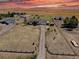 Expansive aerial view of ranch property with multiple buildings and long driveway entrance at 43400 Somerset Ct, Elizabeth, CO 80107