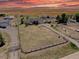 Expansive aerial view of the property showcasing the land, outbuildings and gated entrance at 43400 Somerset Ct, Elizabeth, CO 80107