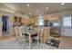 Eat-in kitchen featuring wooden cabinets, stainless steel appliances, and a cozy dining area at 43400 Somerset Ct, Elizabeth, CO 80107