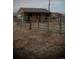 Rustic, open-sided shed surrounded by fencing, suitable for storage or livestock shelter at 43400 Somerset Ct, Elizabeth, CO 80107