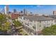 Beautiful Denver building with city views, showcasing a rooftop perspective of modern urban living at 837 E 17Th Avenue # 2K, Denver, CO 80218
