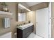 Modern bathroom with double sink vanity, large mirror, and excellent lighting at 837 E 17Th Avenue # 2K, Denver, CO 80218