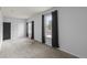 Bright bedroom with large windows, carpet flooring, and ample natural light at 837 E 17Th Avenue # 2K, Denver, CO 80218