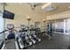 Fitness center with modern exercise equipment, TV, and mirrors for a complete workout experience at 837 E 17Th Avenue # 2K, Denver, CO 80218