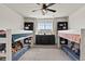 bedroom with two bunk beds, dresser, and plenty of storage at 2614 Hillcroft Ln, Castle Rock, CO 80104