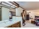 Primary bathroom features a double vanity, and plenty of countertop space at 8155 Everett E St, Arvada, CO 80005