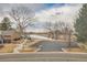 Scenic view of a parking lot with a park nearby, showcasing convenience and recreational opportunities at 8155 Everett E St, Arvada, CO 80005