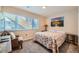 Bright bedroom with a comfortable bed and window at 17624 E Peakview Ave, Aurora, CO 80016