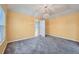 Bright dining room with neutral walls and carpet at 17624 E Peakview Ave, Aurora, CO 80016