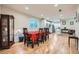 Open dining room with hardwood floors and kitchen views at 17624 E Peakview Ave, Aurora, CO 80016