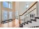 Entryway with hardwood floors, staircase and double doors at 17624 E Peakview Ave, Aurora, CO 80016