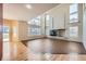 Two-story living room with high ceilings, fireplace and large windows at 17624 E Peakview Ave, Aurora, CO 80016