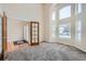 Sunlit home office with hardwood floors and french doors at 17624 E Peakview Ave, Aurora, CO 80016