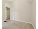 Bedroom with neutral carpet, white walls, window, and trim at 351 Bannock St, Denver, CO 80223