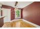 Inviting dining room with hardwood floors, stylish lighting, and large windows for natural light at 351 Bannock St, Denver, CO 80223