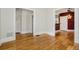 Charming living room with hardwood floors and easy access to other rooms, perfect for entertaining at 351 Bannock St, Denver, CO 80223