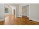 Bright living room with hardwood floors and large window, offering natural light and charm at 351 Bannock St, Denver, CO 80223