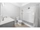 Bathroom featuring a shower, toilet, and sink with modern fixtures at 610 S Alton Way # 7C, Denver, CO 80247