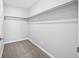 Walk-in closet with carpet and shelving unit at 610 S Alton Way # 7C, Denver, CO 80247