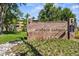 Sign at Windsor Gardens, with golf course and restaurant, with beautiful landscaping and rock features at 610 S Alton Way # 7C, Denver, CO 80247