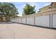 A row of garages for resident parking in front of mature trees, with ample room for vehicle storage at 610 S Alton Way # 7C, Denver, CO 80247