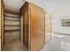 Storage area with shelving, cabinets, and ample space at 610 S Alton Way # 7C, Denver, CO 80247