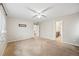 Bedroom with ceiling fan and view into the bathroom at 2633 Garganey Dr, Castle Rock, CO 80104