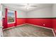 Bedroom with hardwood floors and a view of the street at 2633 Garganey Dr, Castle Rock, CO 80104