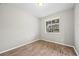 Bright bedroom with neutral walls and hardwood flooring at 2633 Garganey Dr, Castle Rock, CO 80104