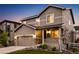 Charming two-story home with a covered porch and well-maintained landscaping at 2633 Garganey Dr, Castle Rock, CO 80104
